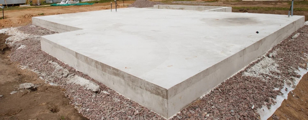 Монолитный плитный фундамент,фото